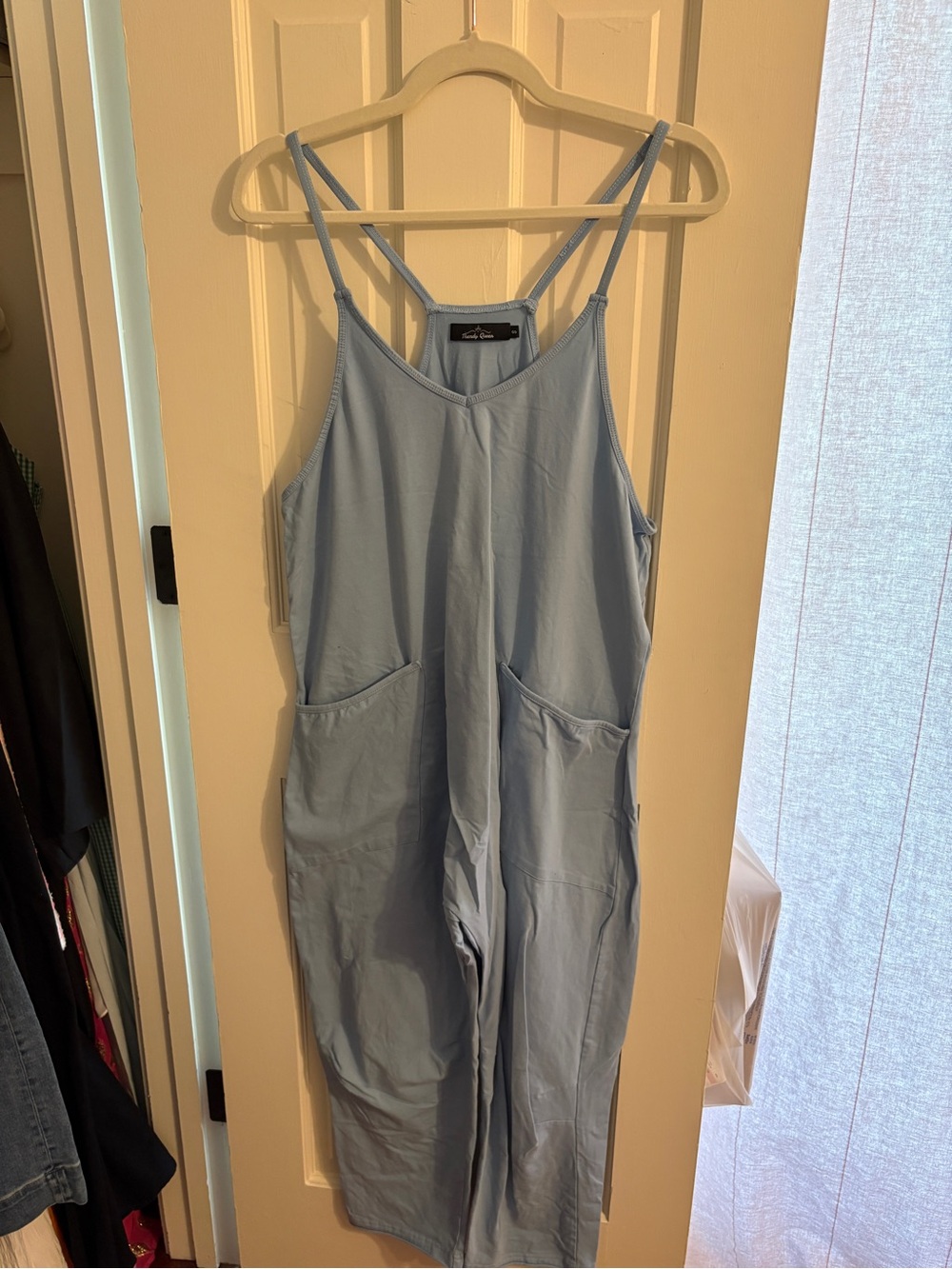 Light Blue Strappy Wide-Leg Jumpsuit with Front Pockets